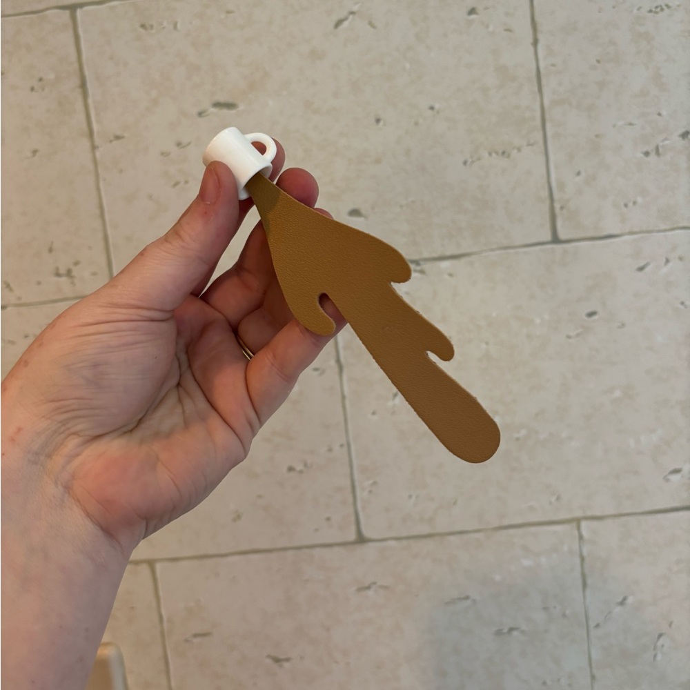 Coffee spill bookmark with plastic mug top